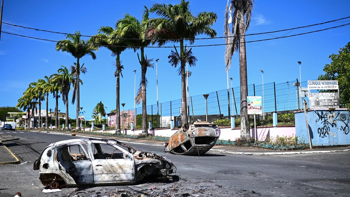 Guadeloupe is blocked and simmering, with Paris calling for calm